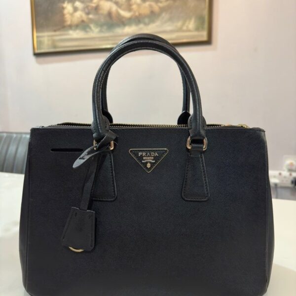 prada_mini_saffiano_handbag_1702603077_9950eadd_progressive.jpg